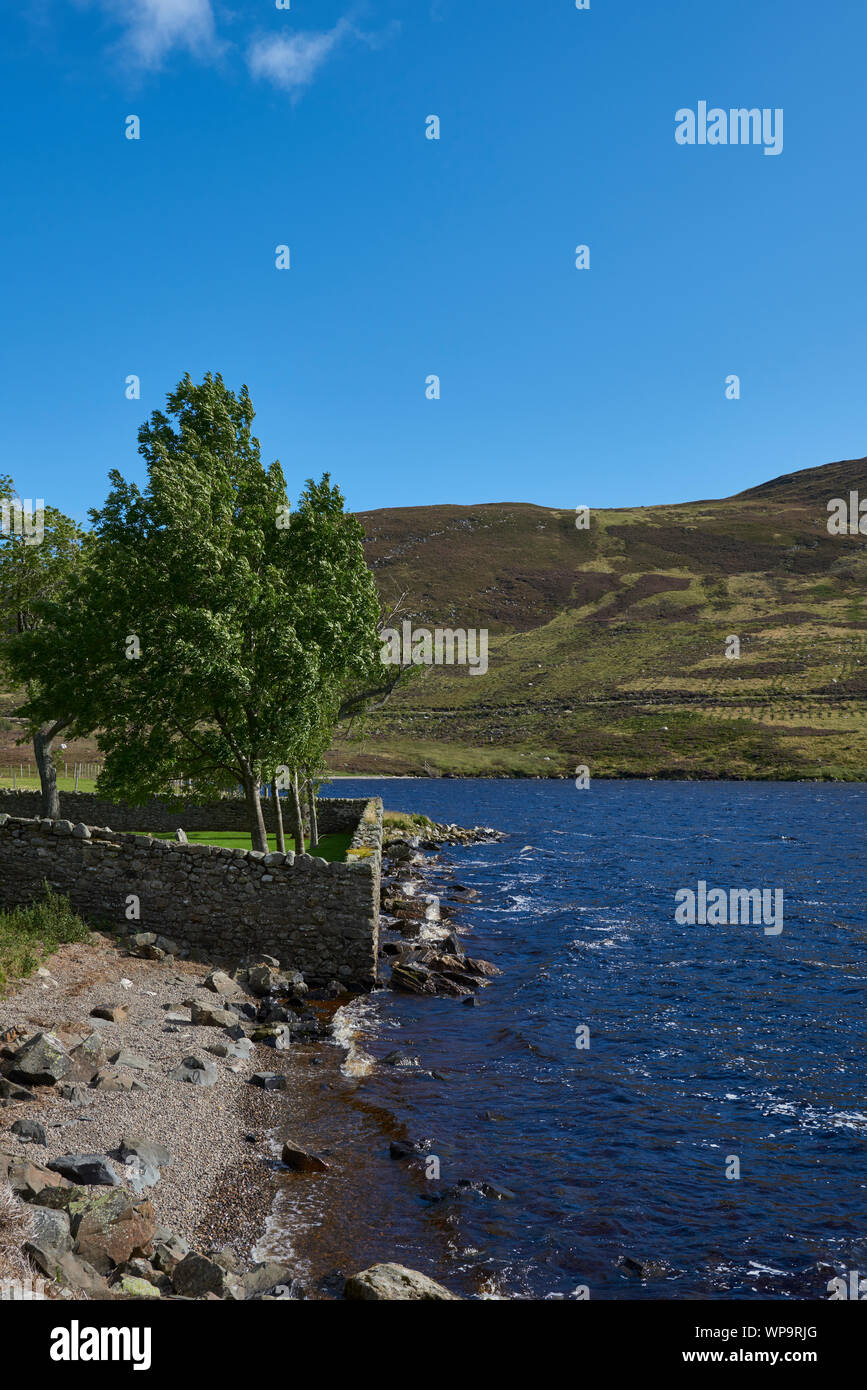 The small Shingle Beach near to the Stone Church Wall of Old Glens