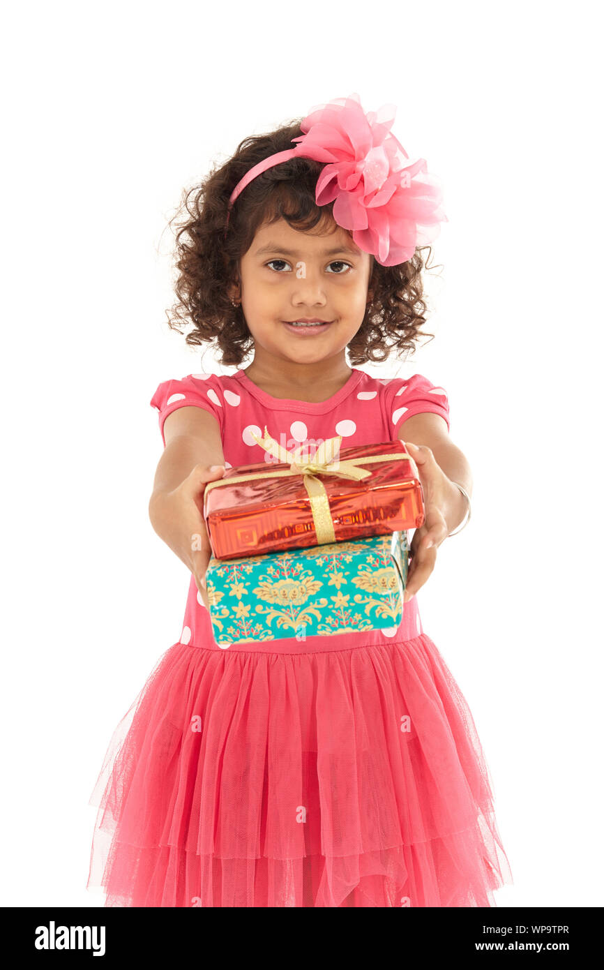 Girl holding pink wrapped gift box hi-res stock photography and images ...