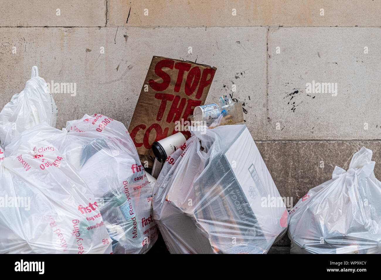 Dumped Stop the Coup placard with waste rubbish on street in Westminster, London, UK after protest against Brexit, the UK leaving the European Union Stock Photo