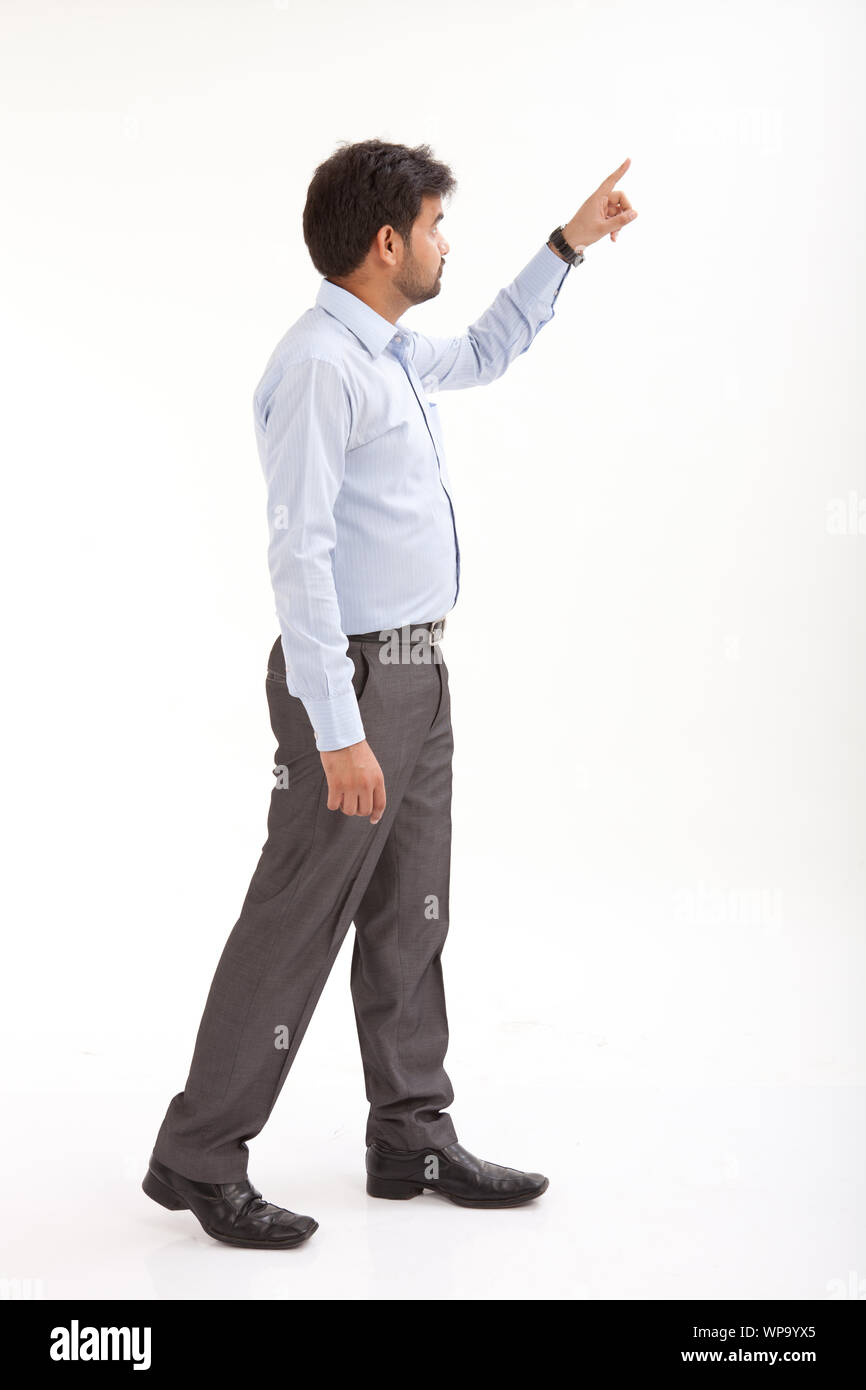 Indian man walking side view hi-res stock photography and images - Alamy