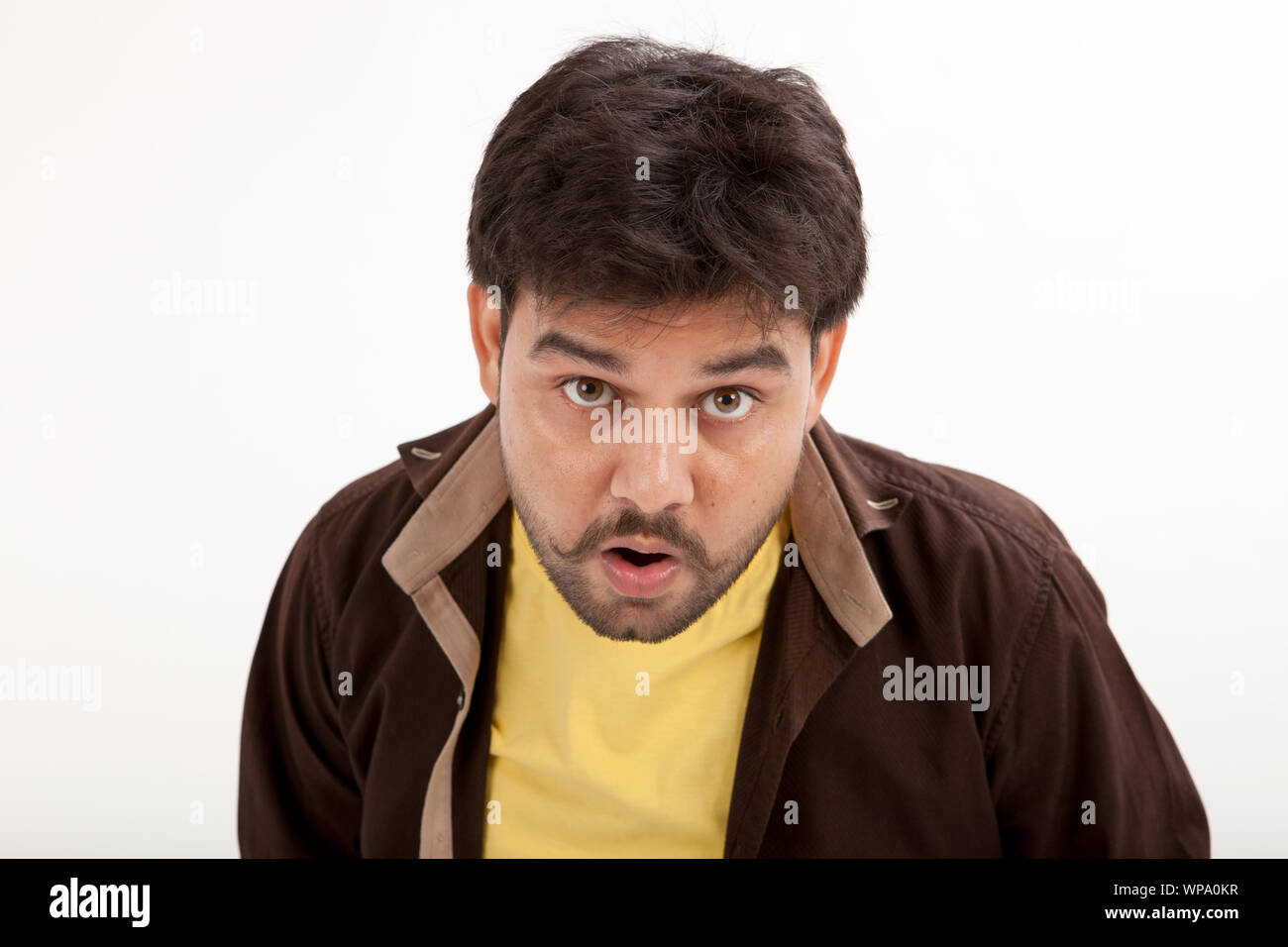 Shocked man looking down hi-res stock photography and images - Alamy