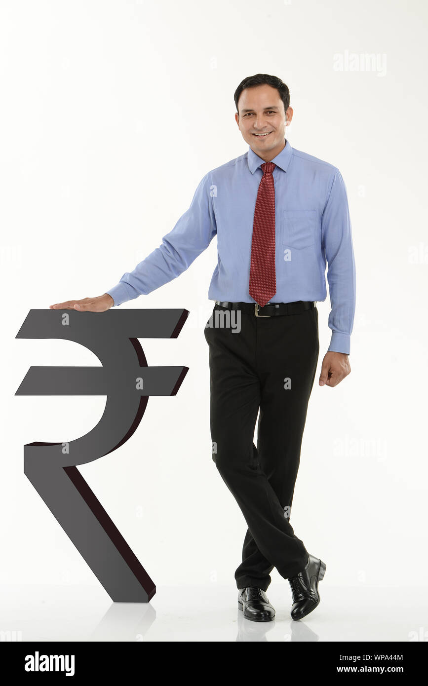 Man and rupee symbol hi-res stock photography and images - Alamy