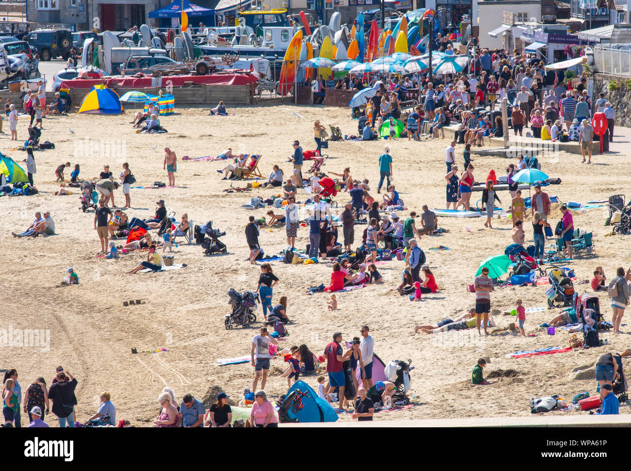 Lyme Regis, Dorset, UK. 8th September 2019. UK Weather: Crowds flock to the beach at the seaside resort of Lyme Regis to enjoy an afternoon of glorious warm sunshine. Credit: Celia McMahon/Alamy Live News Stock Photo
