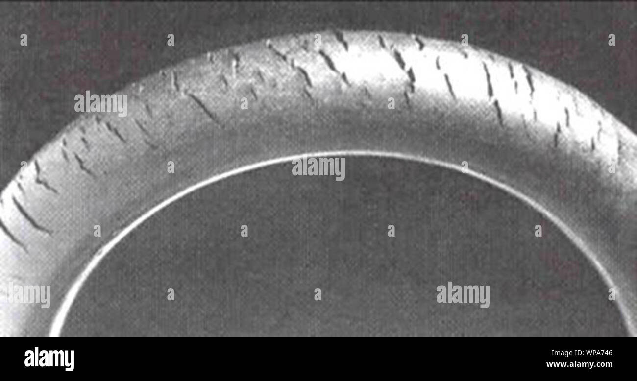 Ozone cracking in natural rubber tubing Stock Photo Alamy