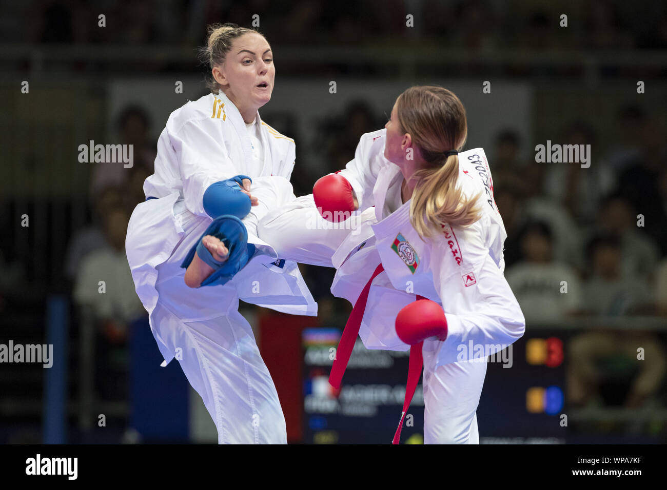 Tokyo, Japan. 8th Sep, 2019. Irina Zaretska of Azerbaijan (red) fights against Alizee Agier of France (blue) for the gold medal of the Female Kumite's -68 kg category at the Karate1 Premier League Tokyo 2019. The Karate1 Premier League is held from September 6 to 8 at the Nippon Budokan. The Karate will make its debut appearance at the Tokyo 2020 Summer Olympic Games. Irina Zaretska won the gold. Credit: Rodrigo Reyes Marin/ZUMA Wire/Alamy Live News Stock Photo