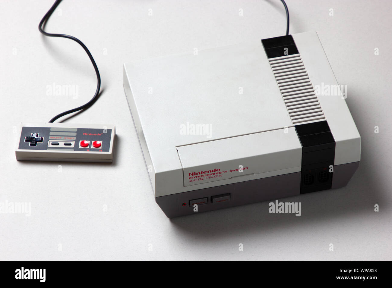 a beautfiul studio shot of the original 'NES' Nintendo Entertainment System TV gaming console Stock Photo