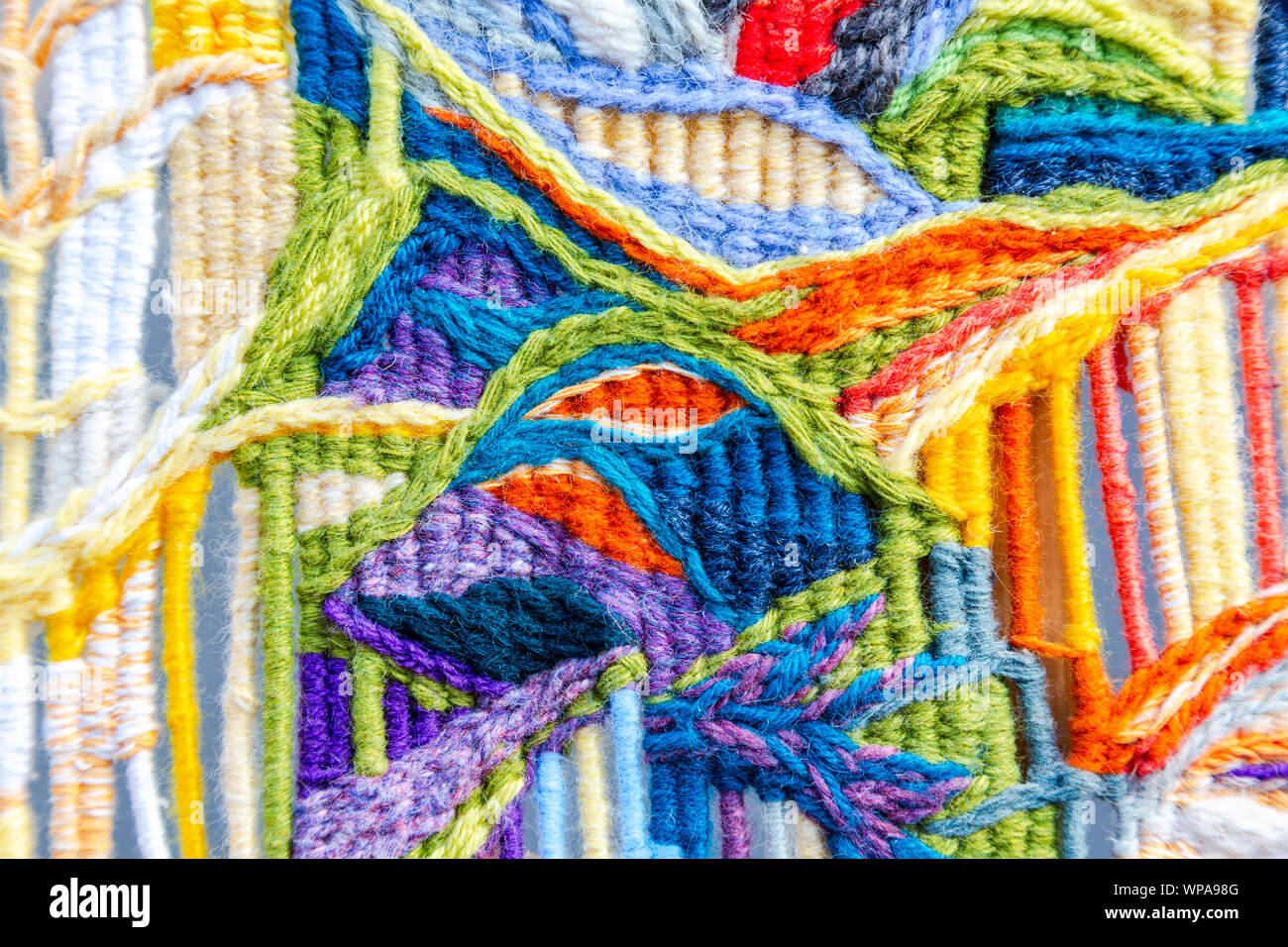 Woolen multicolored threads texture as background close up Stock Photo