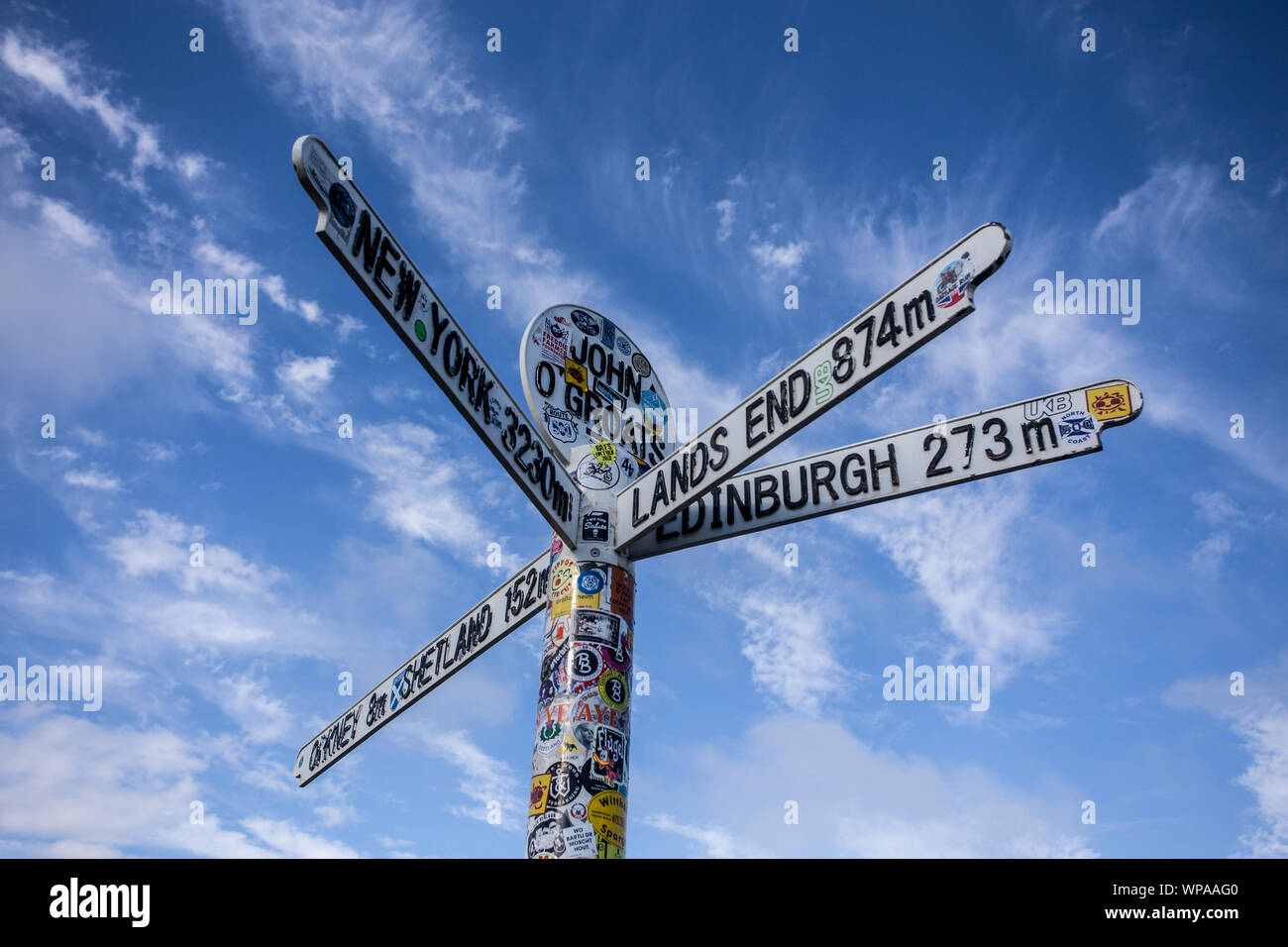 The milepost sign at John O Groats in Scotland Stock Photo