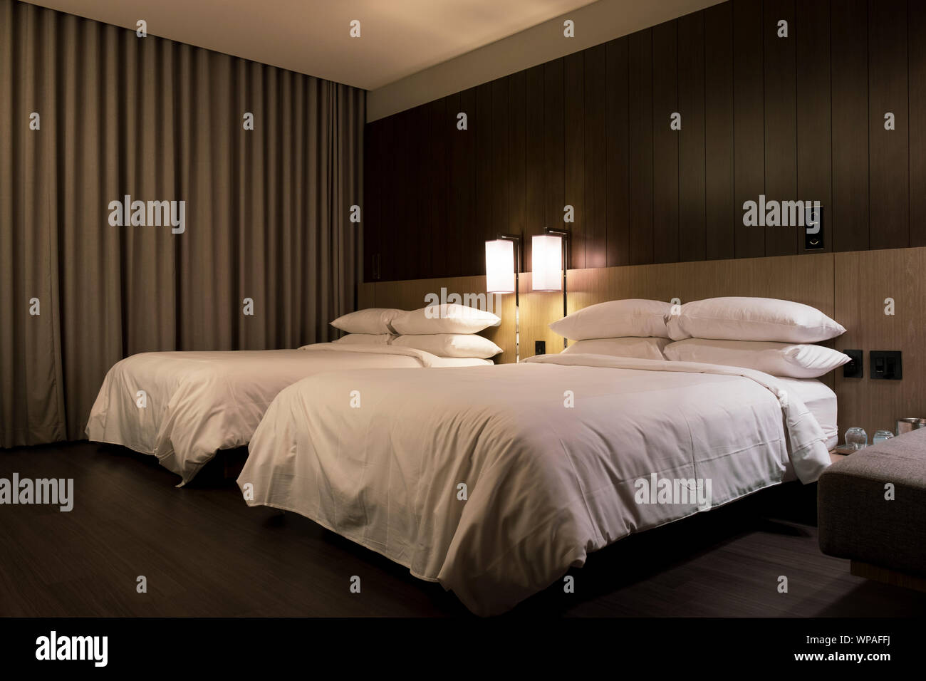Standard double beds hotel room Stock Photo