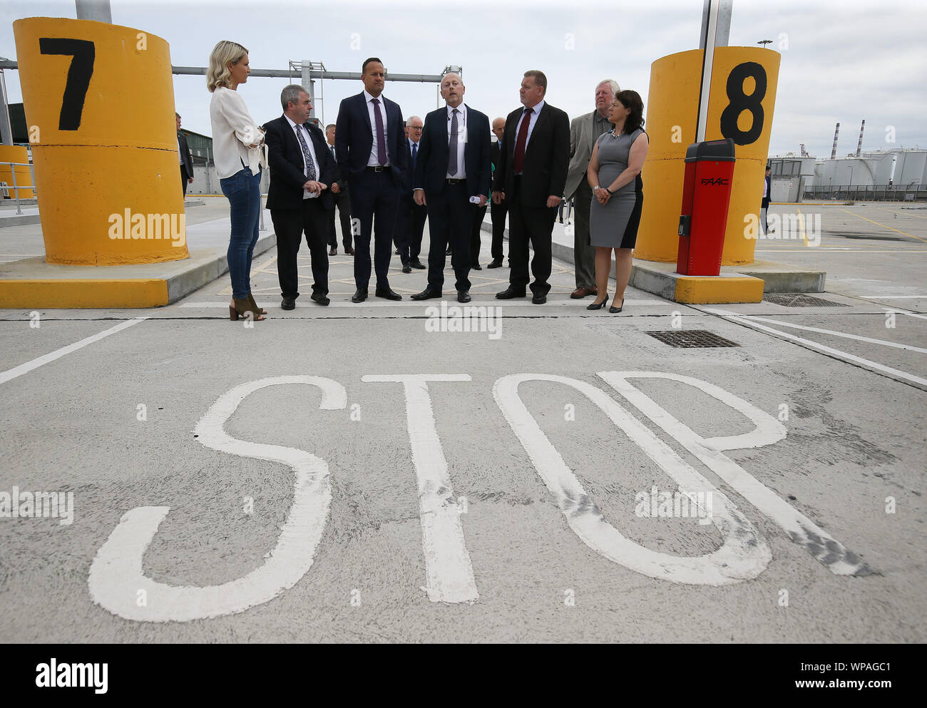 Taoiseach Leo Varadkar (third left) and European Affairs Minister Helen McEntee (left) with port and customs officials during a visit to new physical infrastructure at Dublin Port which has been put in place to meet the requirements for customs, SPS and health checks on consignments of goods imported from or transiting the UK. Stock Photo