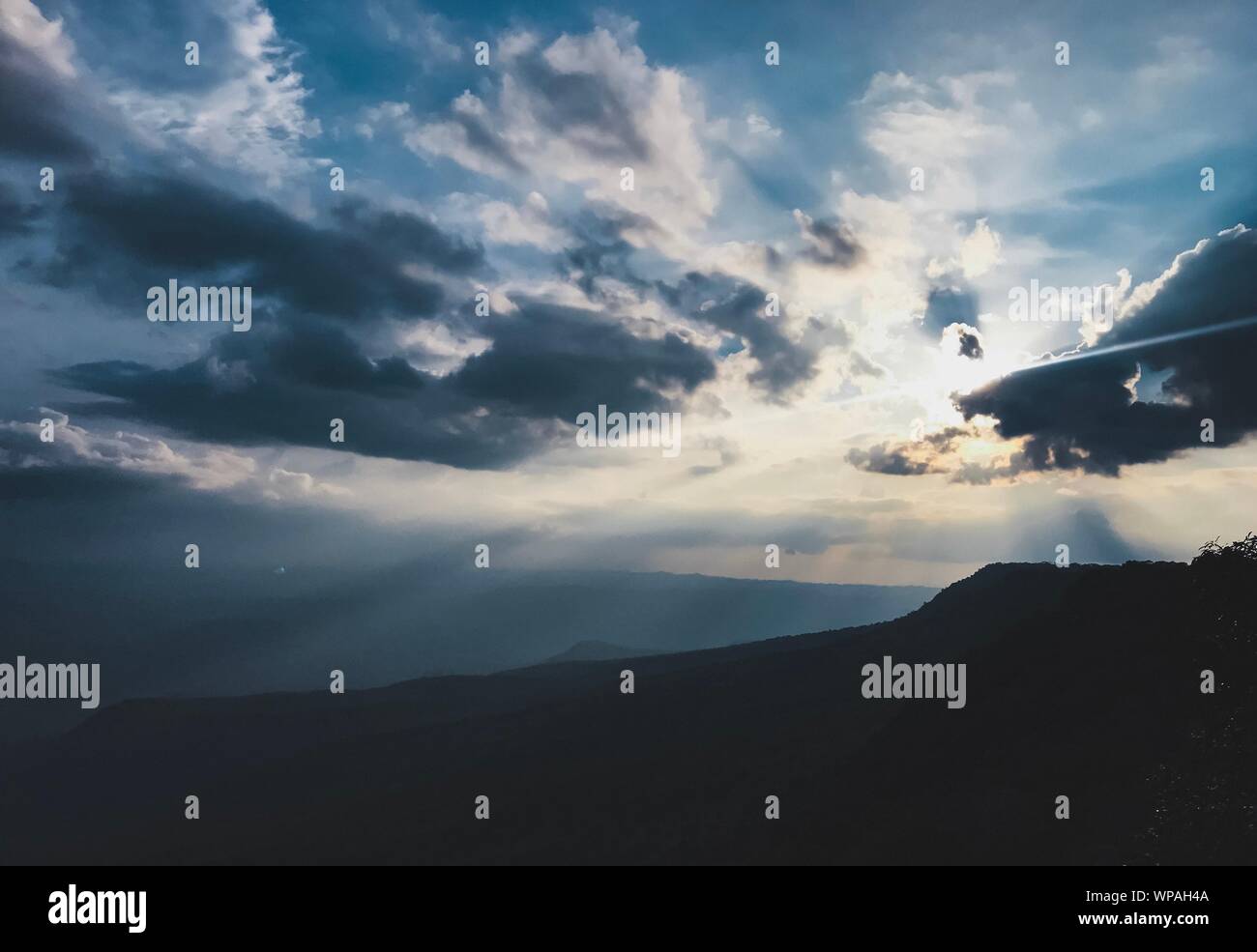 Sunset on the mountain Stock Photo - Alamy