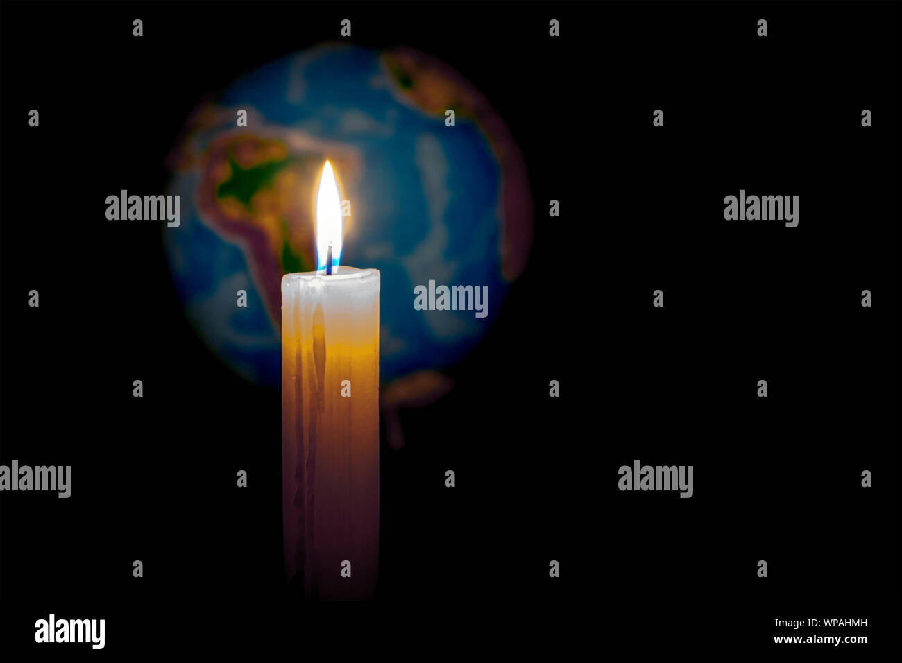 Globe Illuminated by candle. Concept of global warming or earth hour.Soft focus Stock Photo Alamy