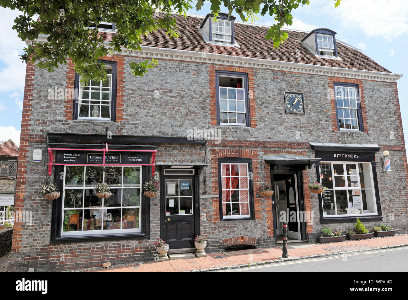 Shops and view of the main high street in Alfriston Village in East Sussex, England, UK  KATHY DEWITT Stock Photo