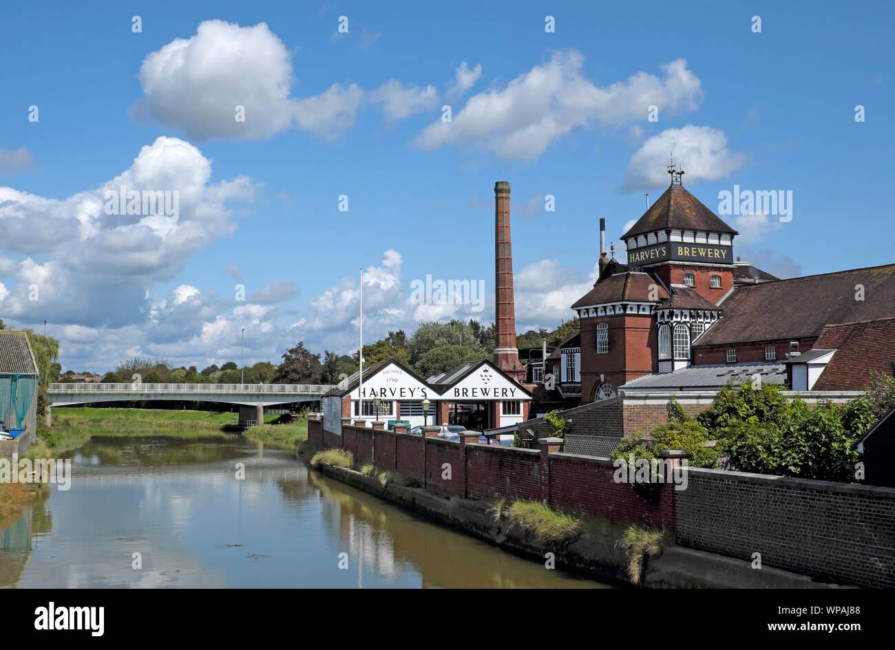 Landscape view of Harveys Brewery buildings on the River Ouse in the town of Lewes East Sussex England UK  KATHY DEWITT Stock Photo