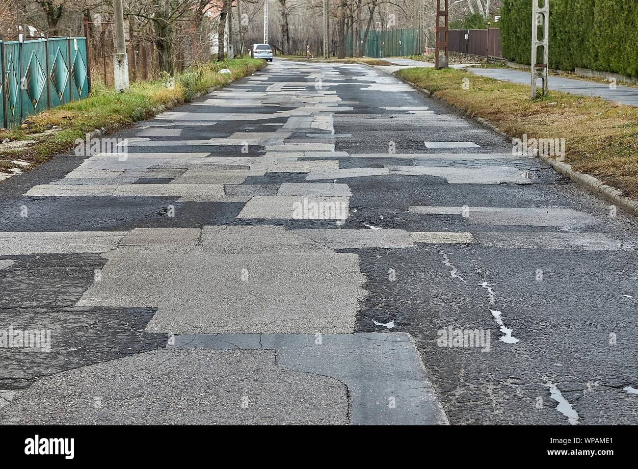 Patched broken road Stock Photo Alamy