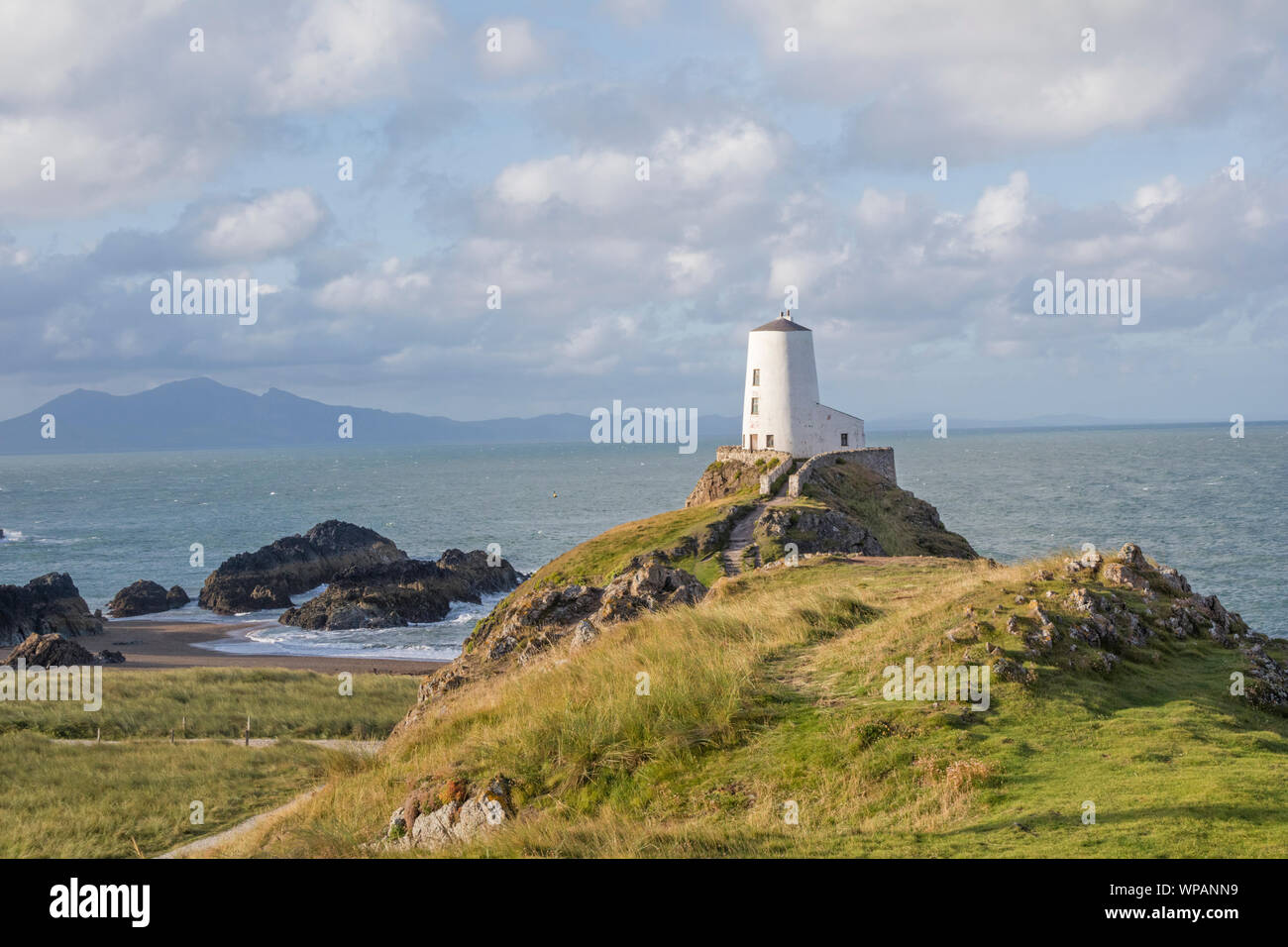 Tŵr Mawr lighthouse on Llanddwyn Island, 'Welsh;Ynys Llanddwyn', part of Newborough Warren National Nature Reserve, Anglesey, North Wales, UK Stock Photo