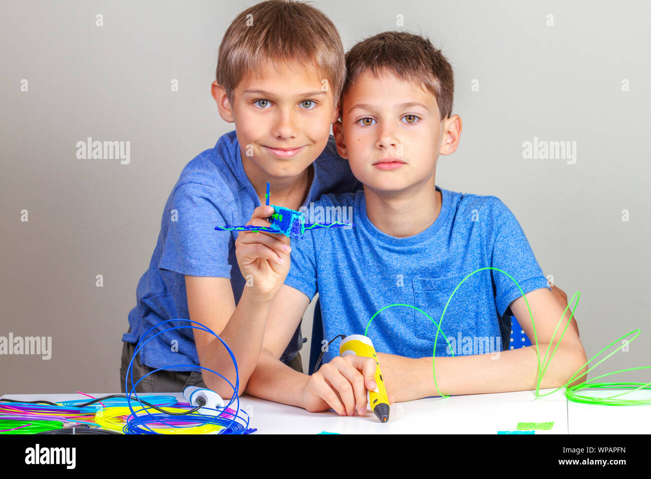 Children creating with 3d printing pens Stock Photo - Alamy