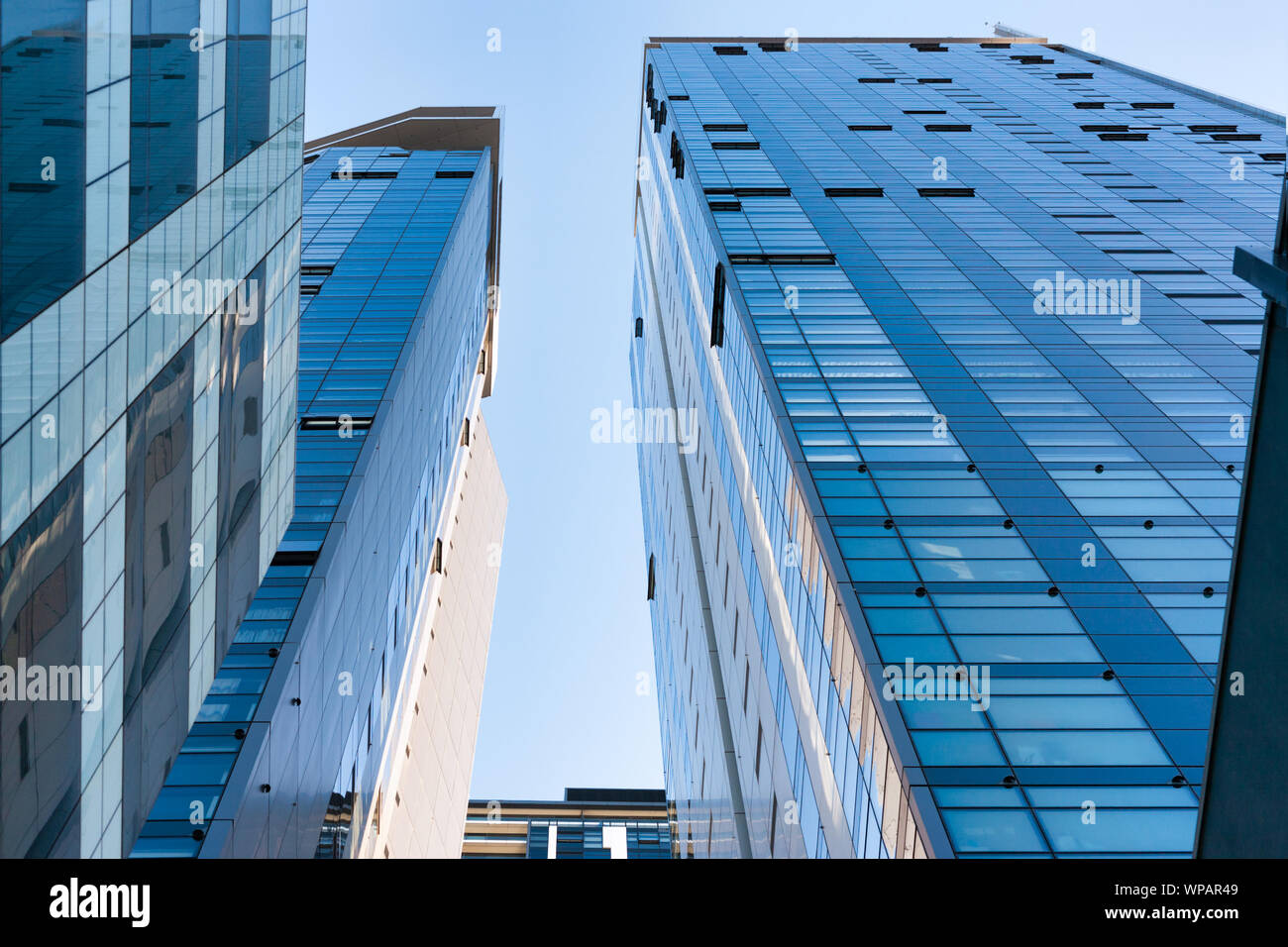 Gleaming glass high rise blue sky day Stock Photo