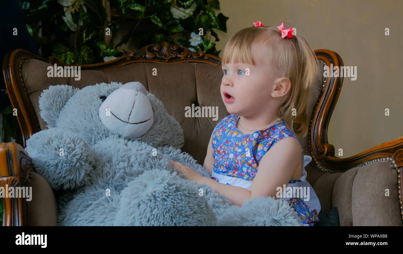 Portrait of funny little girl at home Stock Photo - Alamy