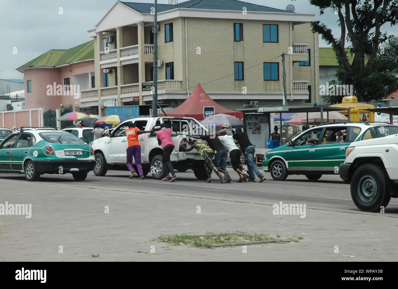 Helping act on african street. Stock Photo