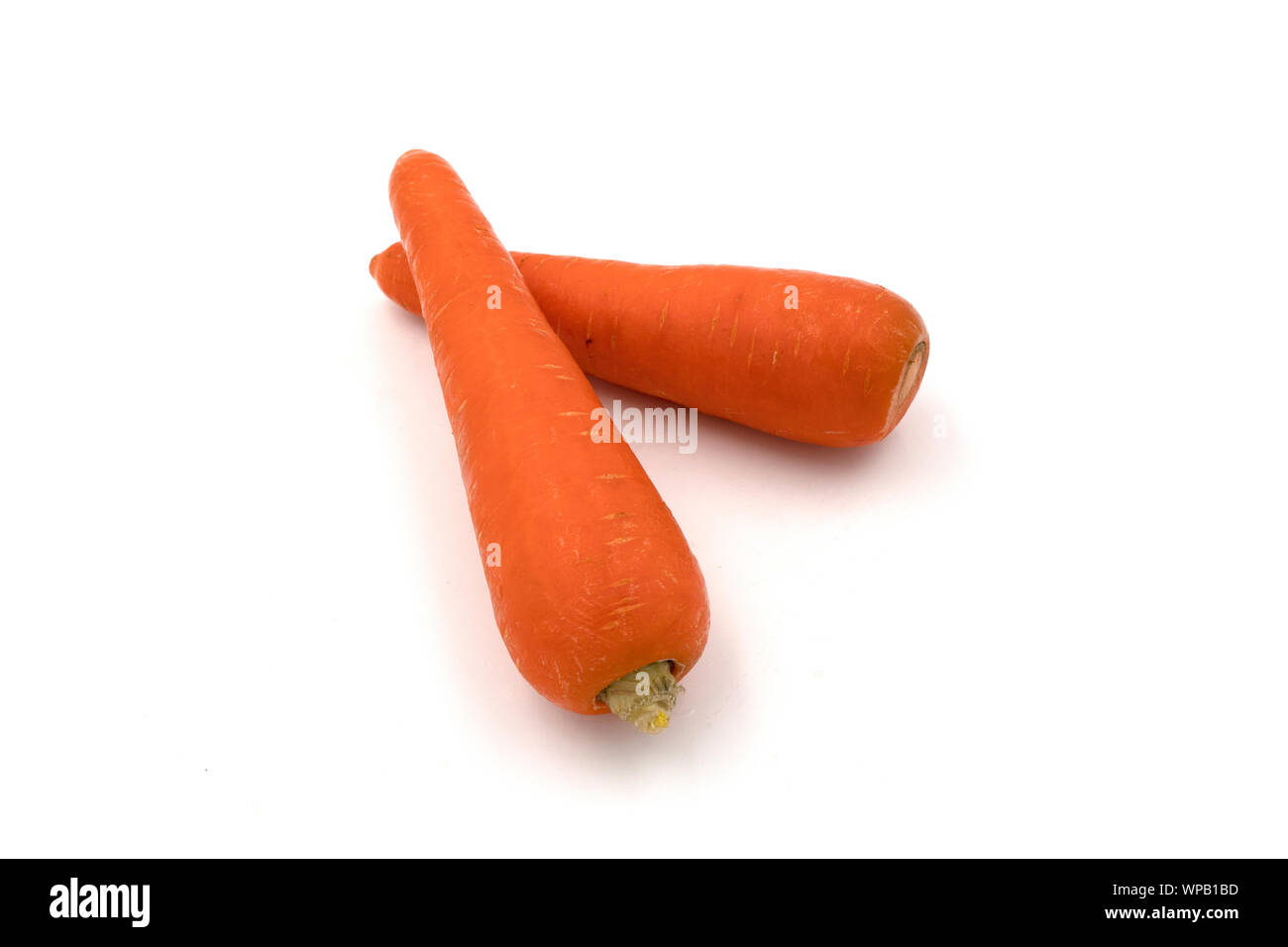 Beautiful sweet fresh raw carrots healthy juices isolated on white