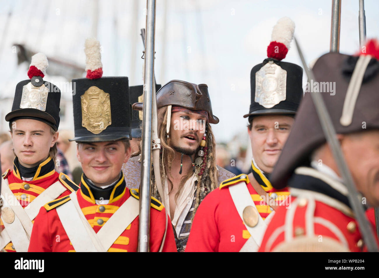 8th September 2019. Great Yarmouth Maritime Festival.  Captain Jack Sparrow, played by look-alike Matt Harris, in the custody of the East Norfolk Militia re-enactment group. Stock Photo