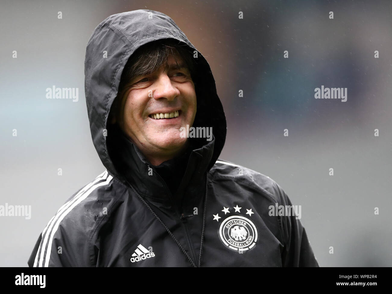 08 September 2019, Great Britain, Belfast: Soccer: National team, final training Germany before the European Championship qualifier Northern Ireland - Germany in Windsor Park Stadium. National coach Joachim Löw laughs during the training. Photo: Christian Charisius/dpa Stock Photo