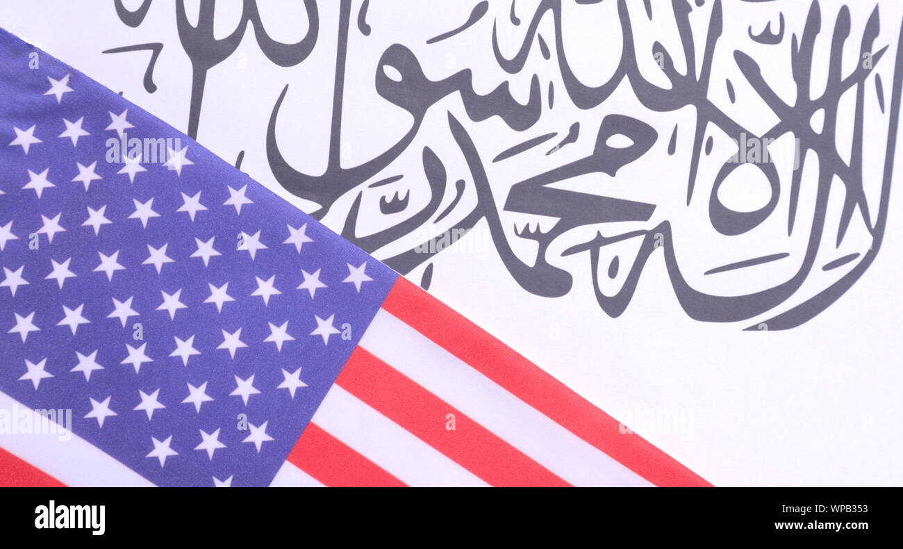 Concept showing of US and Taliban deal preocess showing with flags. Stock Photo