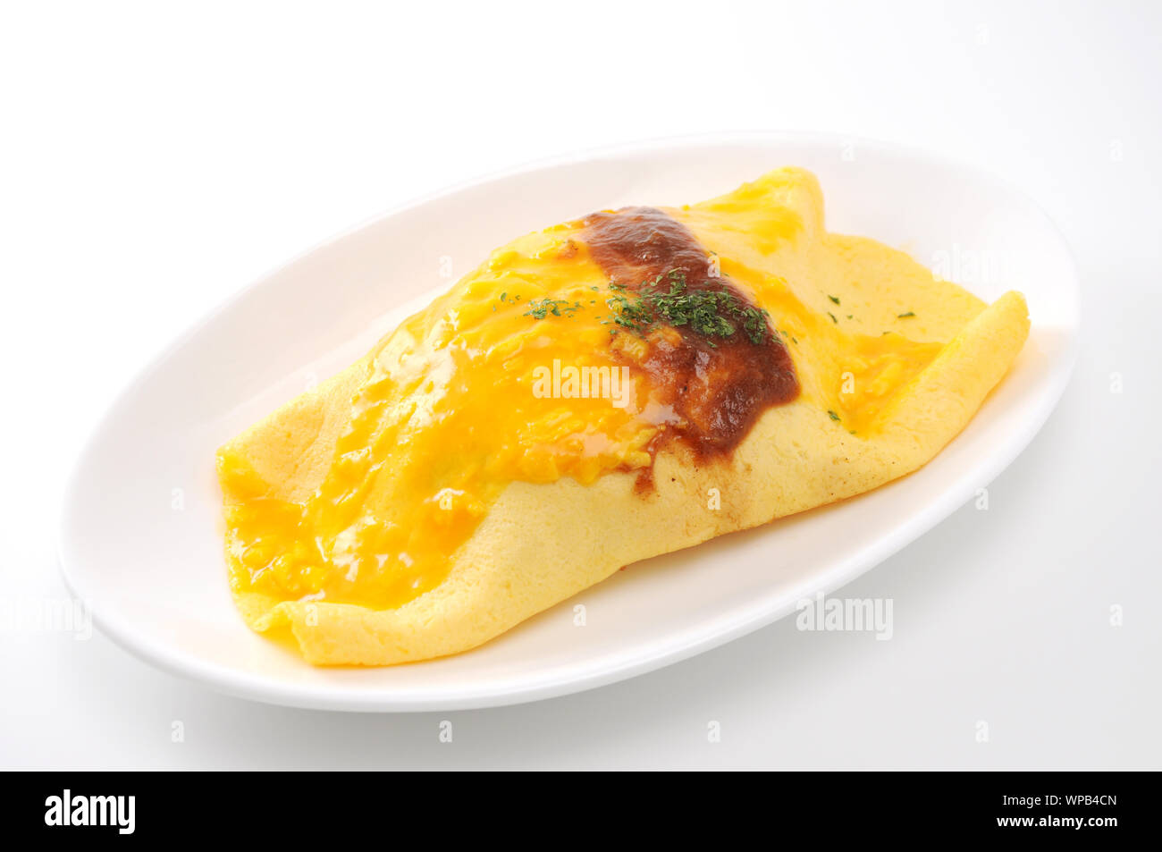 omuraisu omu rice omelet japanese food on plate isolated on white background Stock Photo