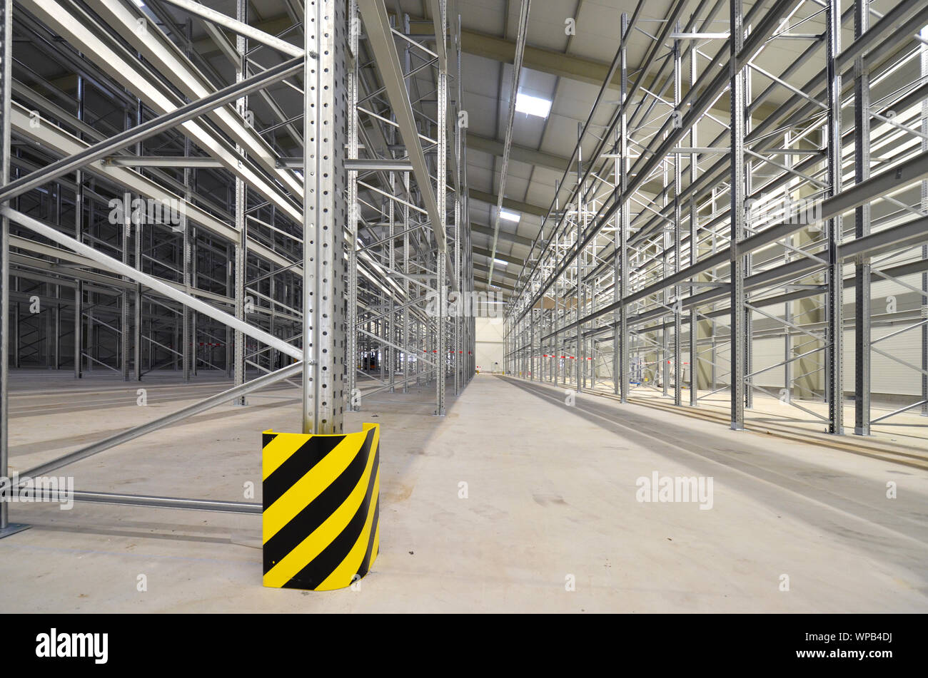 new empty metal rack store warehose Stock Photo - Alamy