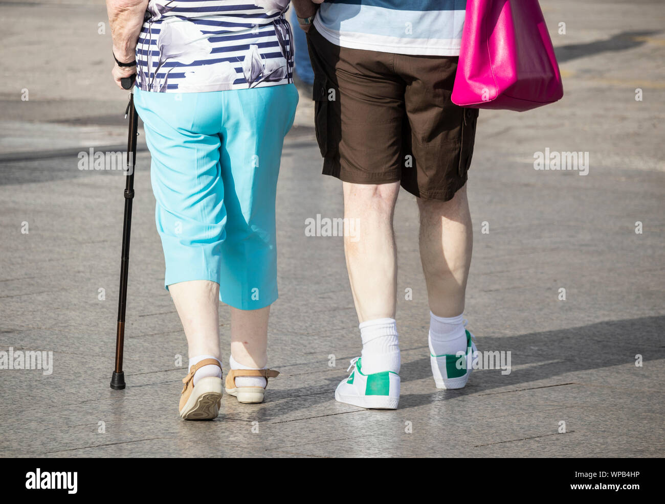 Rear view of mature British couple on holiday in Spain. Stock Photo