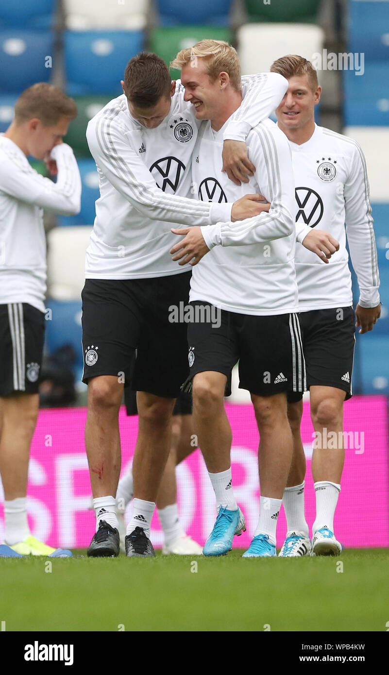 Belfast, UK. 08th Sep, 2019. Soccer: National team, final training Germany before the European Championship qualifier Northern Ireland - Germany in Windsor Park Stadium. The national players Niklas Süle (l) and Julian Brandt talk. Credit: Christian Charisius/dpa/Alamy Live News Stock Photo