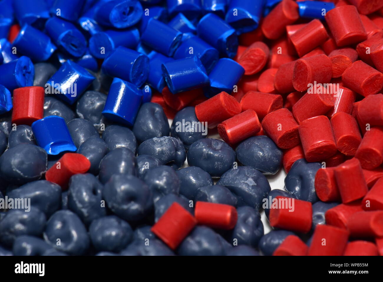 several plastic polymer granulates dyed in lab Stock Photo