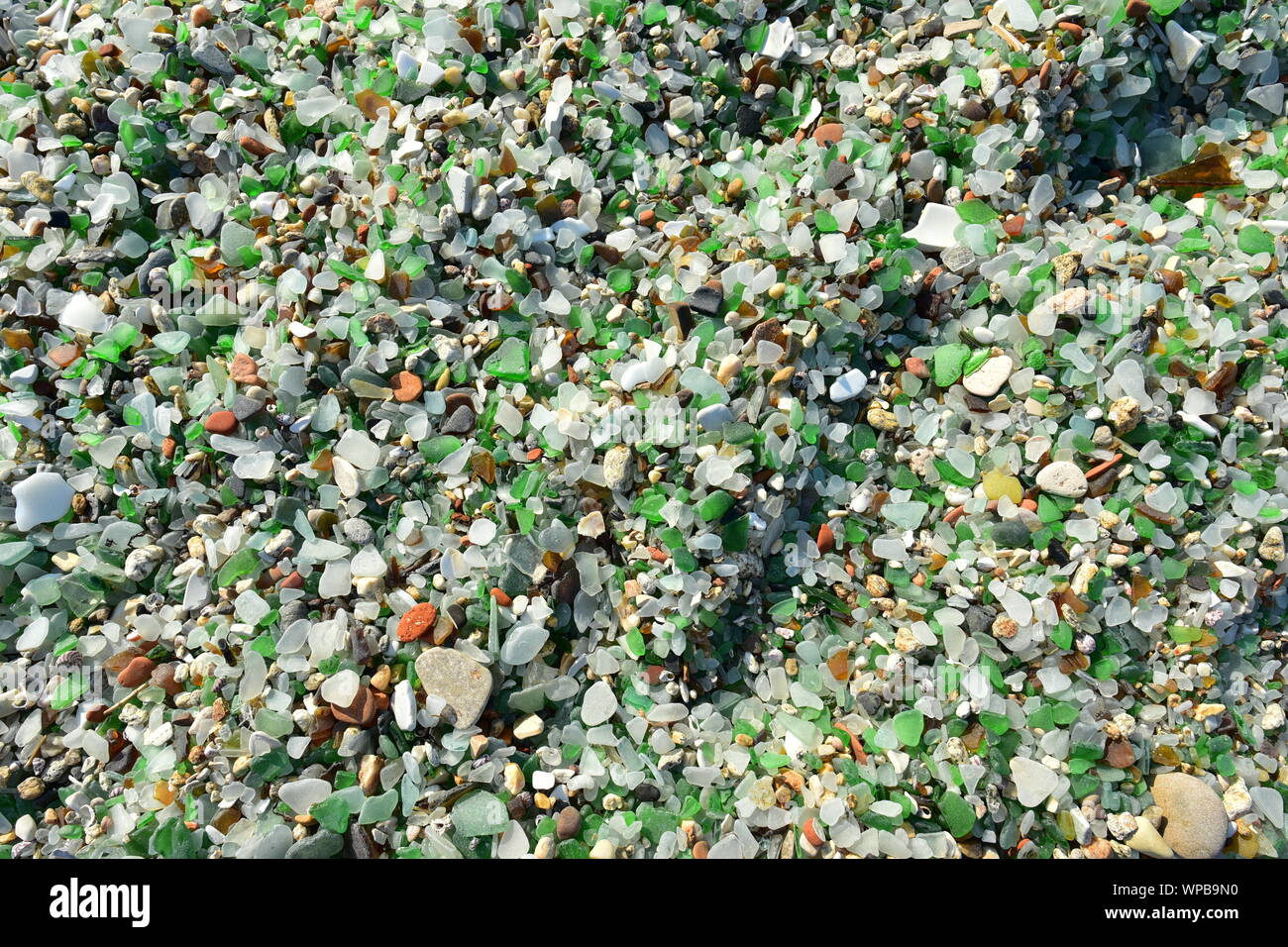 millions of eroded glass cullets on beach Stock Photo
