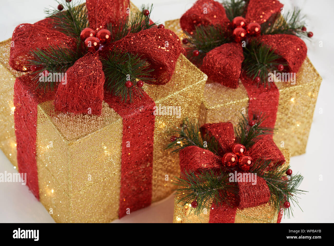 Colorful christmas gift boxes with glitter sparkle blur background Stock Photo