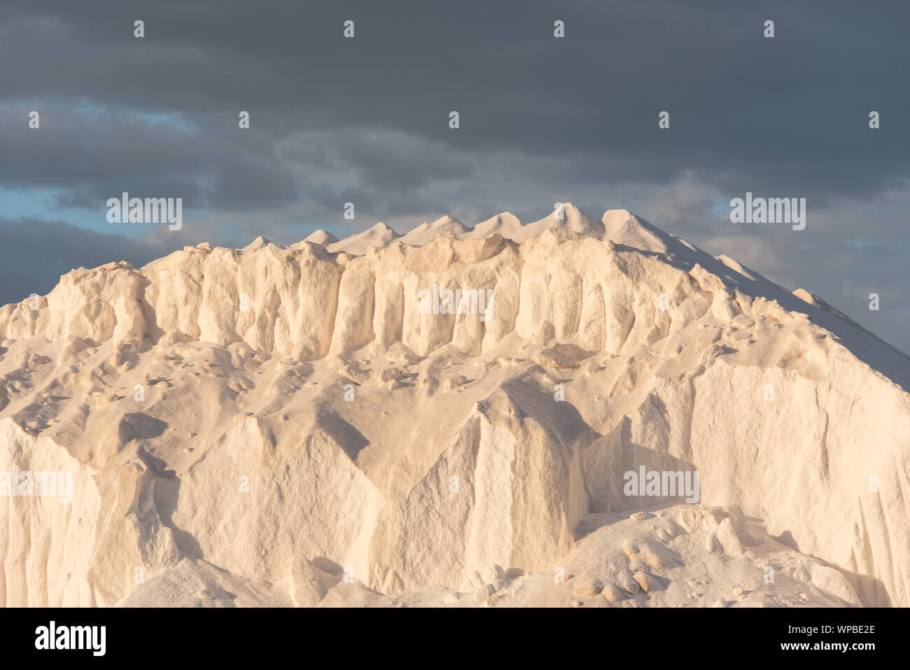 hill of pure salt in salina in south Europe Stock Photo