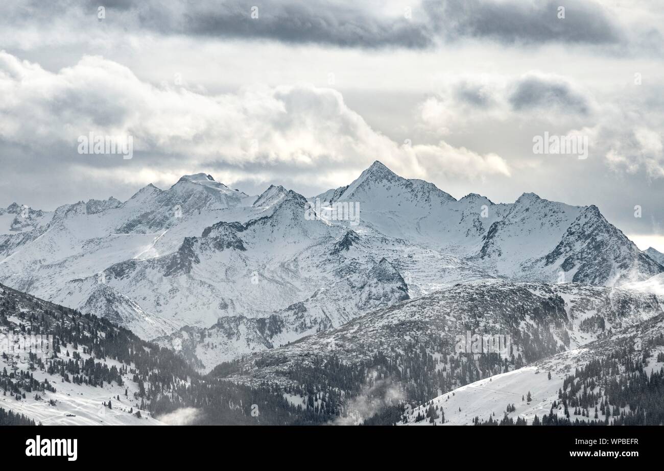 View of snow-covered main Alpine ridge with Grossvenediger, Hochbrixen, Brixen im Thale, Brixental, Tyrol, Austria Stock Photo