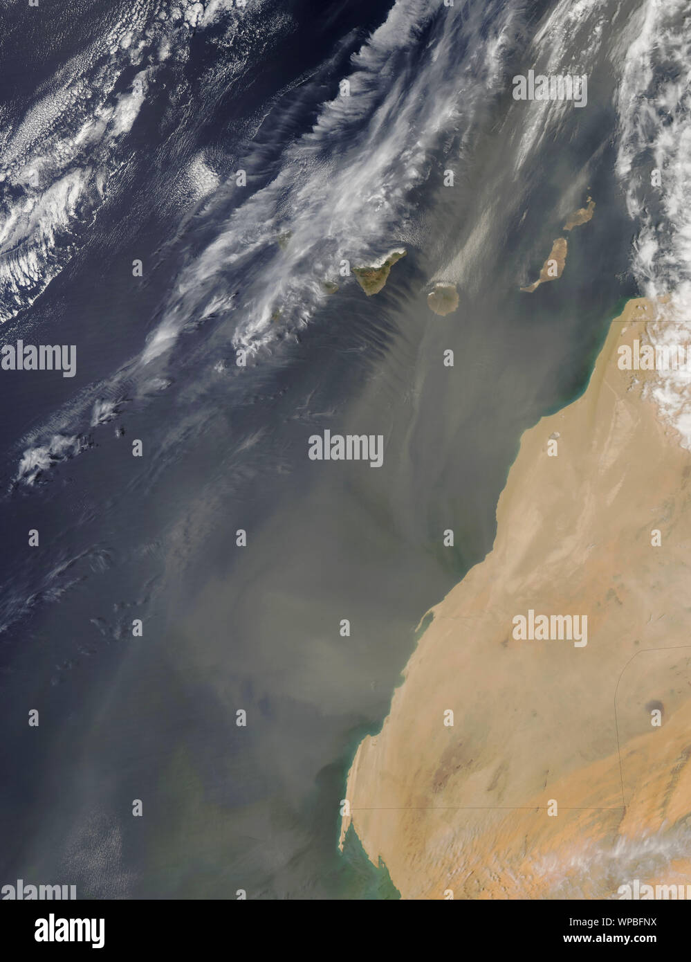 Saharan sand and dust blowing over the Canary islands, April 28, 2010. By NASA/Jeff Schmaltz/DPA Stock Photo