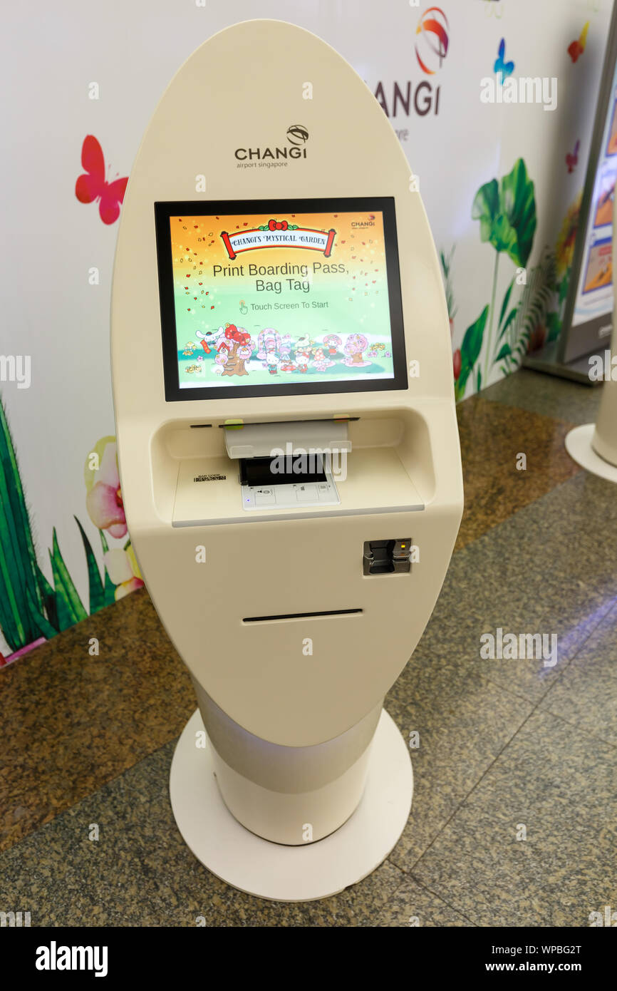Singapore – January 29, 2018: Check-in machine at Changi airport (SIN) in Singapore. Stock Photo