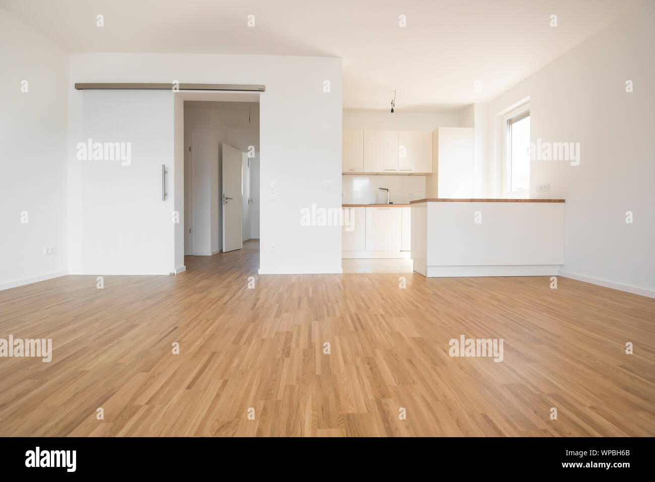 empty flat with wooden beech flooring Stock Photo