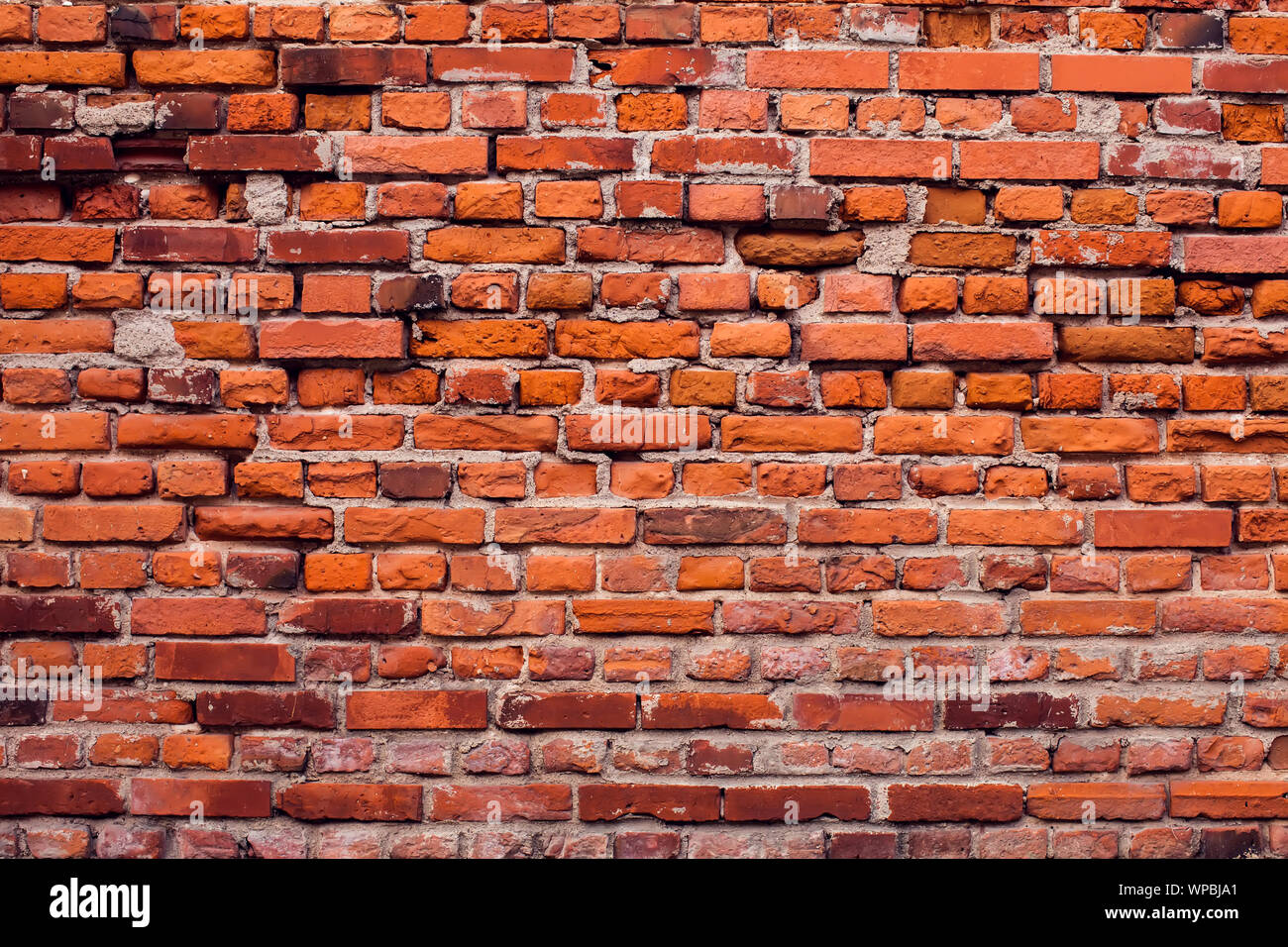 Red vintage bricks wall background. Old building surface Stock Photo - Alamy