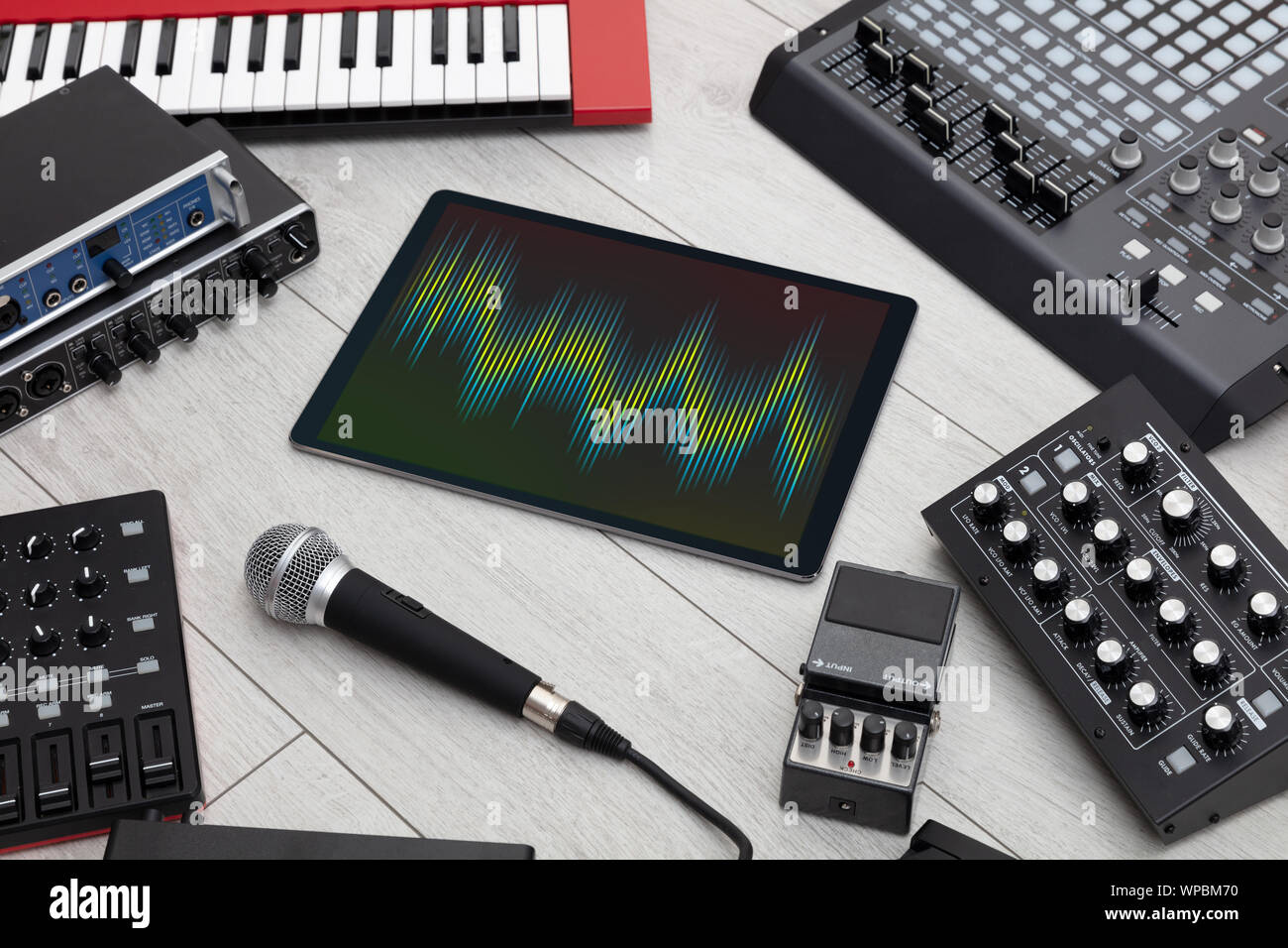Recording music with tablet and electronic music instruments Stock