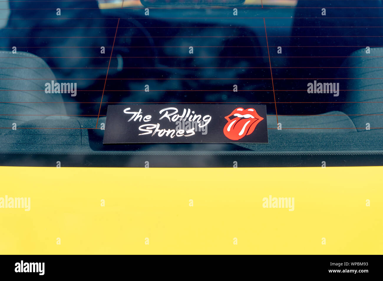 Rolling Stones sticker in the rear window of a car Stock Photo