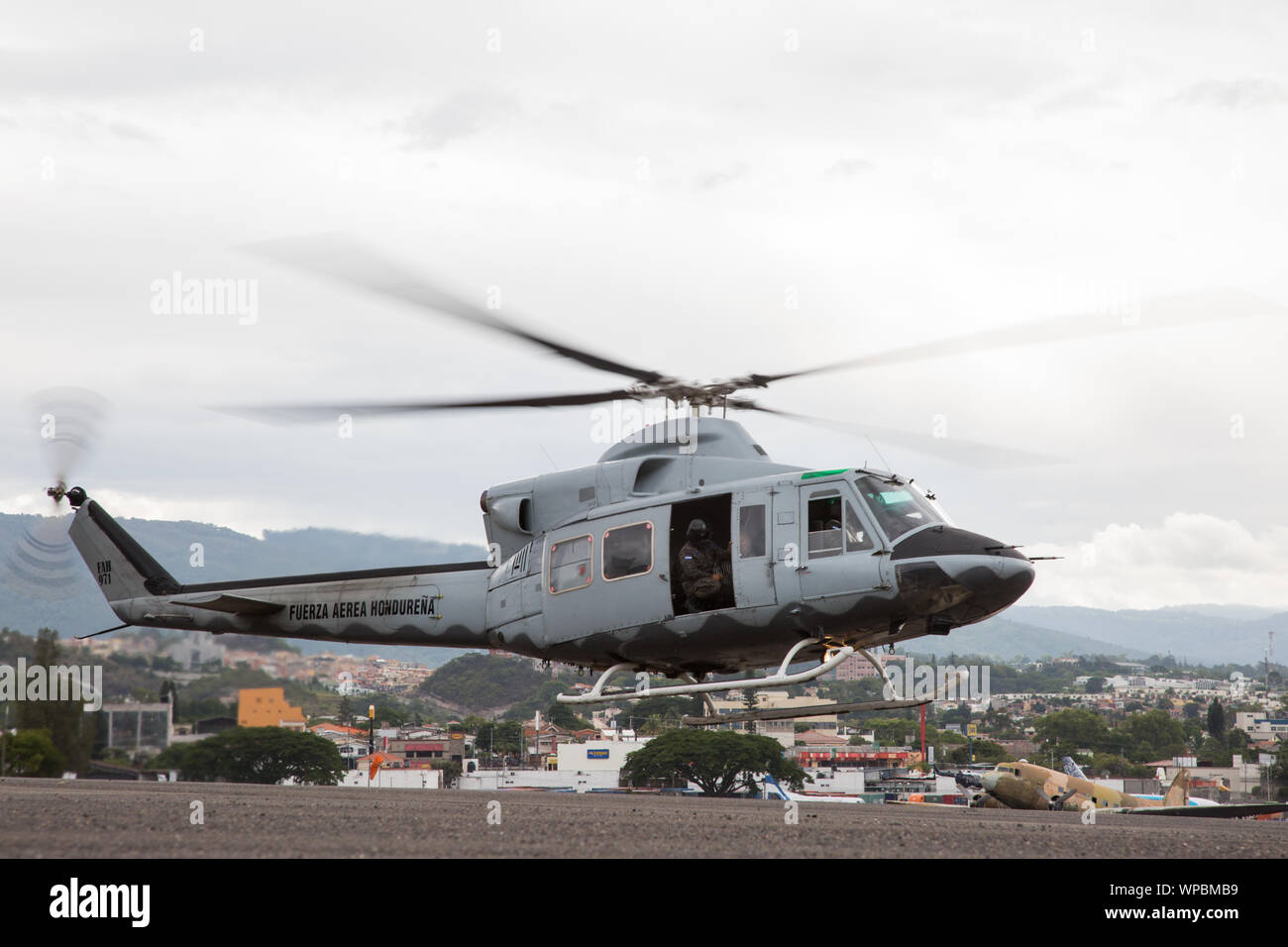 190906-A-IF052-0063 TEGUCIGALPA, Honduras (September 6, 2019) -- A Honduran air force helicopter carrying patients with simulated injuries, takes off, during a mass casualty drill with the U.S. Medical Engagement Team and Honduran military medical personnel, as part of Southern Partnership Station (SPS) 2019. SPS is an annual series of U.S. Navy deployments focused on exchanges with regional partner nation militaries and security forces. SPS 19 consists of fly-away deployments of adaptive force packages to Barbados, Colombia, Guatemala, Honduras and Peru to conduct training and subject matter Stock Photo