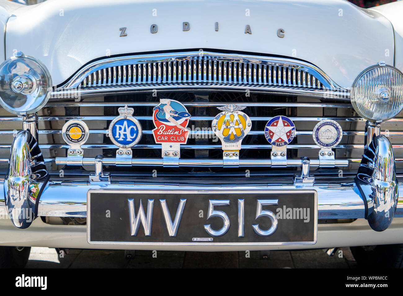Row of badges on the front of a classic Ford Zodiac car Stock Photo