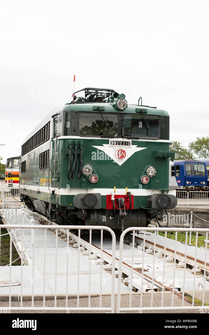 Outdoor displays of trains at the Railway Panorama exhibit at the Cité du Train museum in Mulhouse, France. Stock Photo