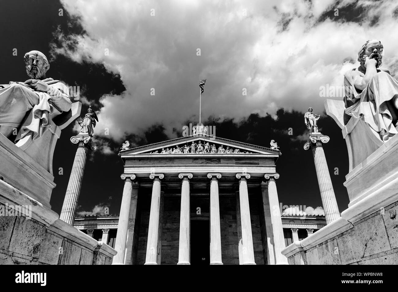 Academy of Athens, Greece, in monochrome. It is a neoclassical landmark of the Greek capital, with statues of Socrates and Plato. Stock Photo