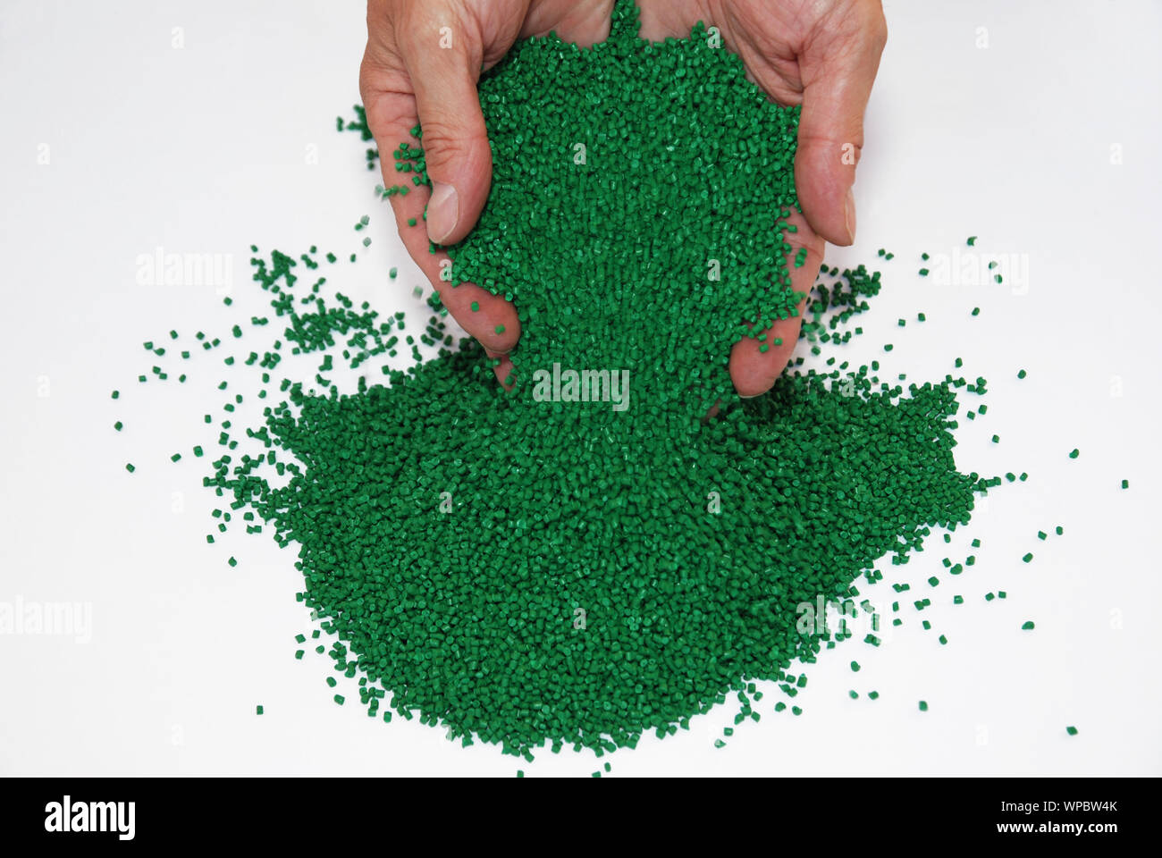 Chemistry checking polymer granulate in laboratory Stock Photo