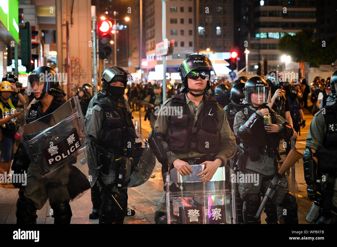 Hong Kong, China. 7th Sep 2019. Riot police stand on a corner in the Mong Kok area of Hong Kong on September 7, 2019, in order to clear crowds of protesters. Police and demonstrators have squared off with increasing frequency and violence as the summer has gone on. Photo by Thomas Maresca/UPIPhoto by Thomas Maresca/UPI Credit: UPI/Alamy Live News Stock Photo