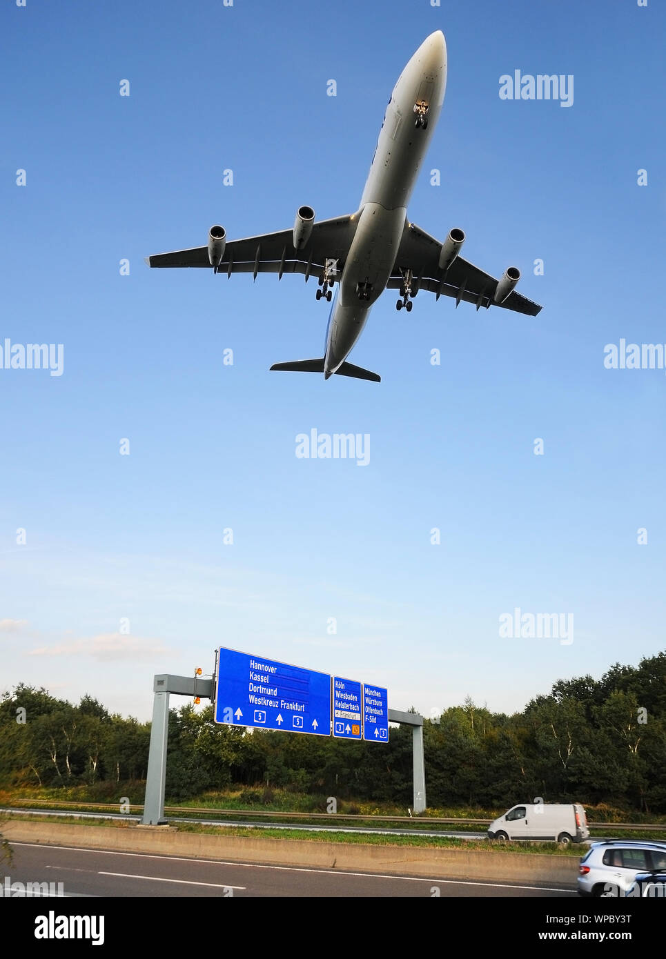 low altitude flight over motorway near Frankfurt airport, Germany Stock Photo